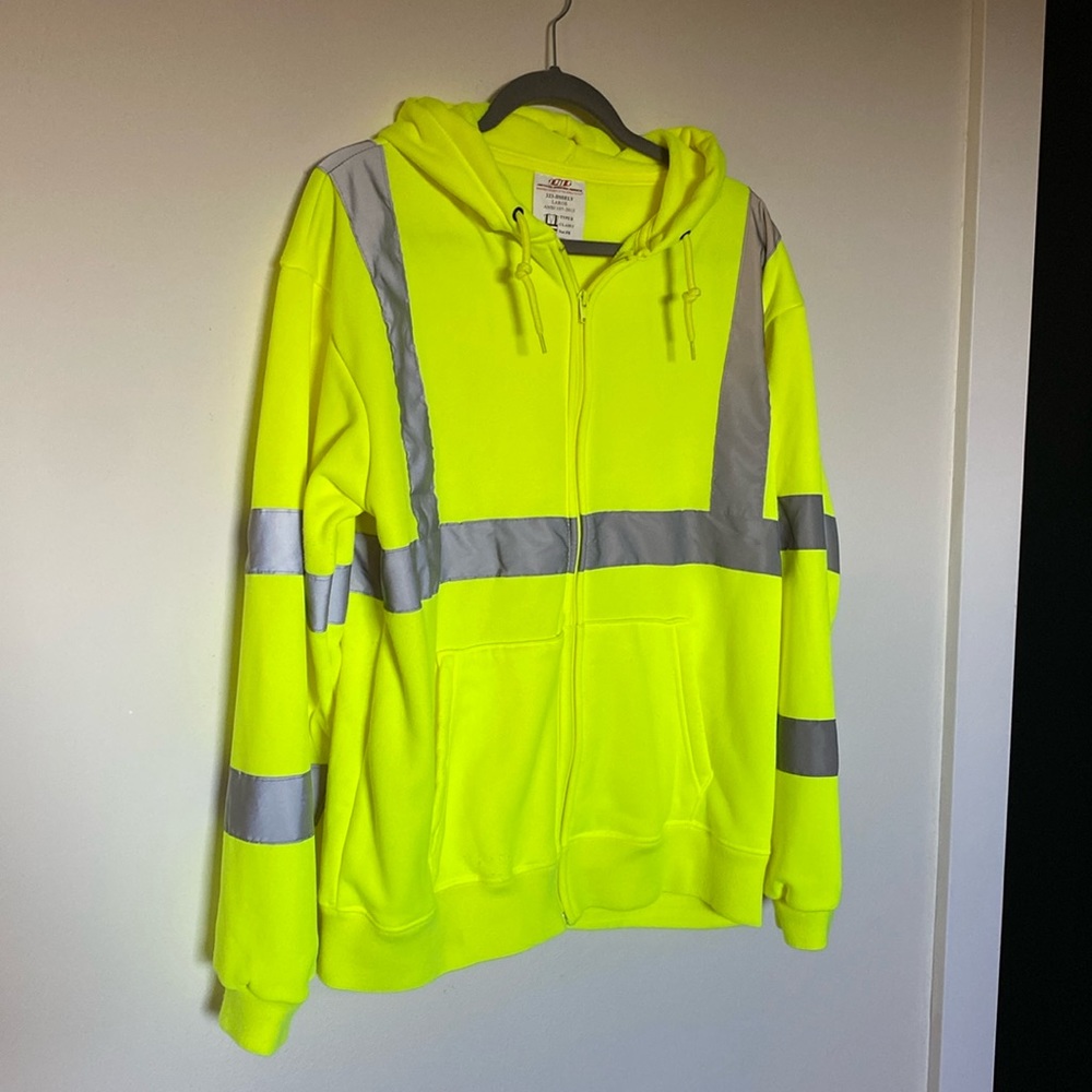 High-visibility zippered hoodie with reflective striping.